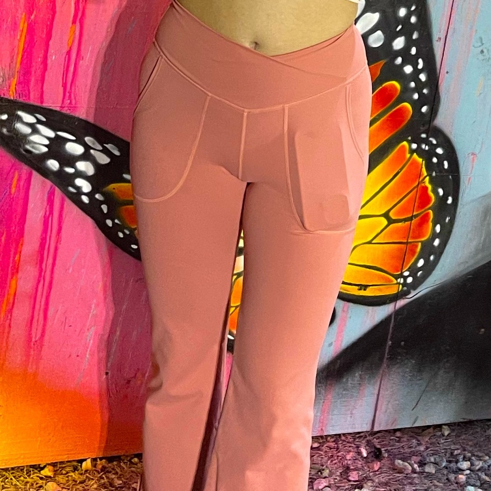 Pink flare leggings with pockets